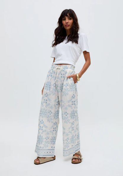 White wide-leg embroidered trousers