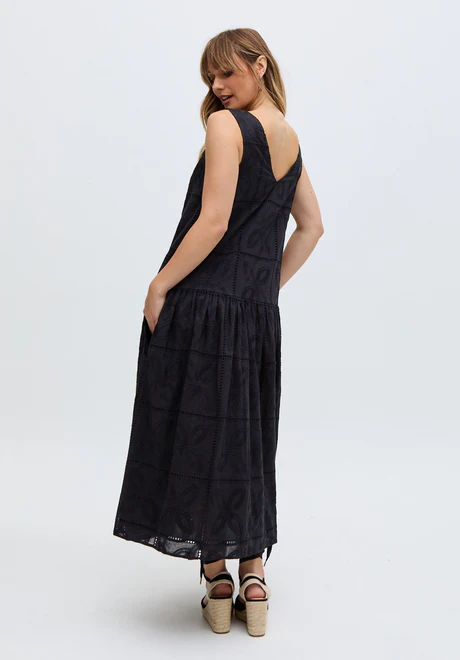 Black full-length, low-waist midi dress The midi dress is the epitome of elegance and sophistication