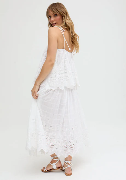 White Ruffled Waist Embroidered Midi Skirt Our embroidered midi skirt features traditional embroidery and cutout detailing.
